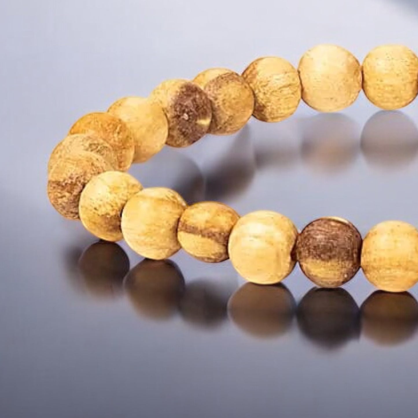 Armband Palo Santo, runda pärlor - Storlek ”S”